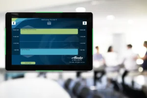 Touch interactive meeting room signs show schedules from your own calendar app, along with messages and alerts